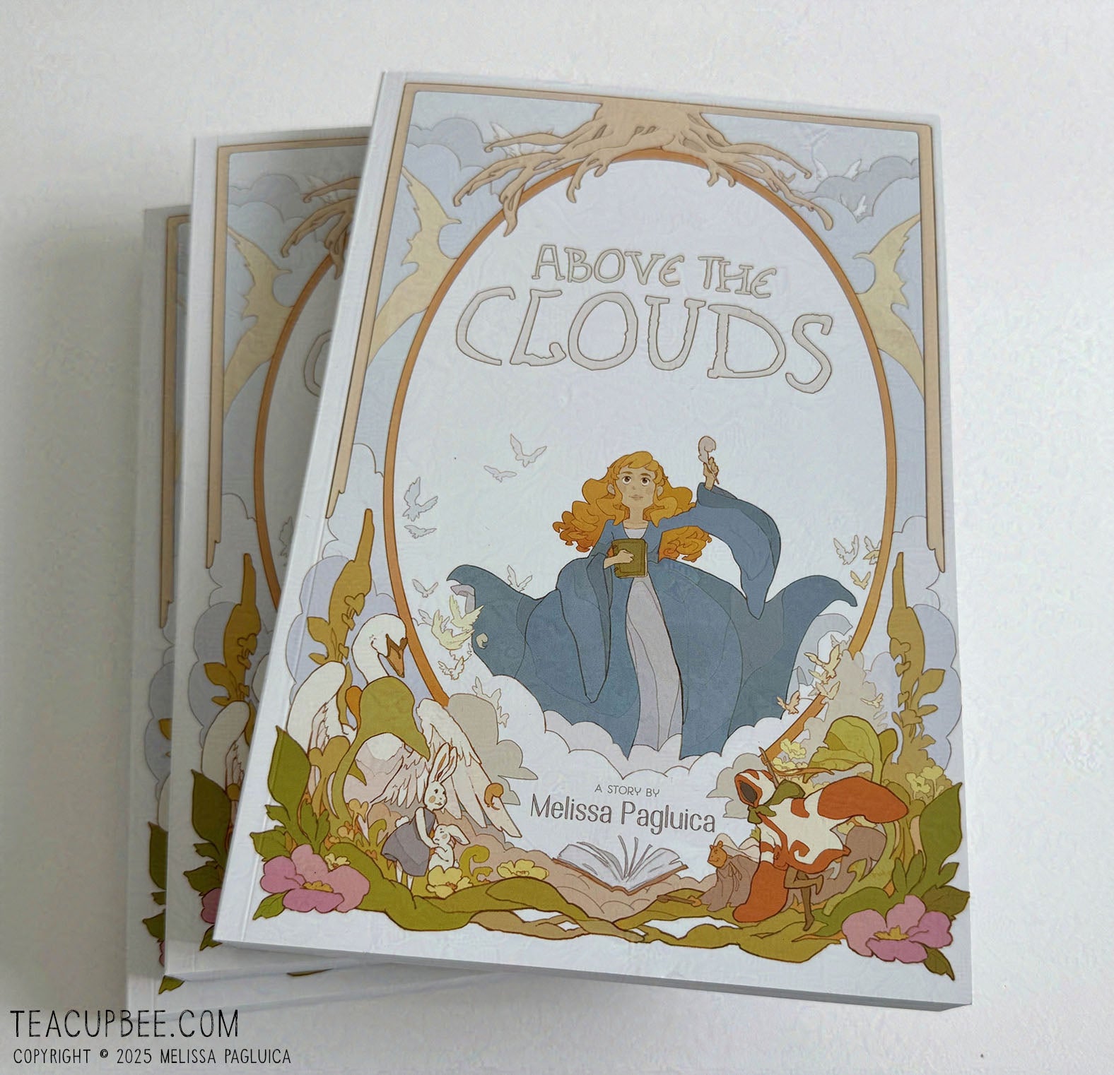 Book titled 'Above the Clouds' with a cover illustration on a white background