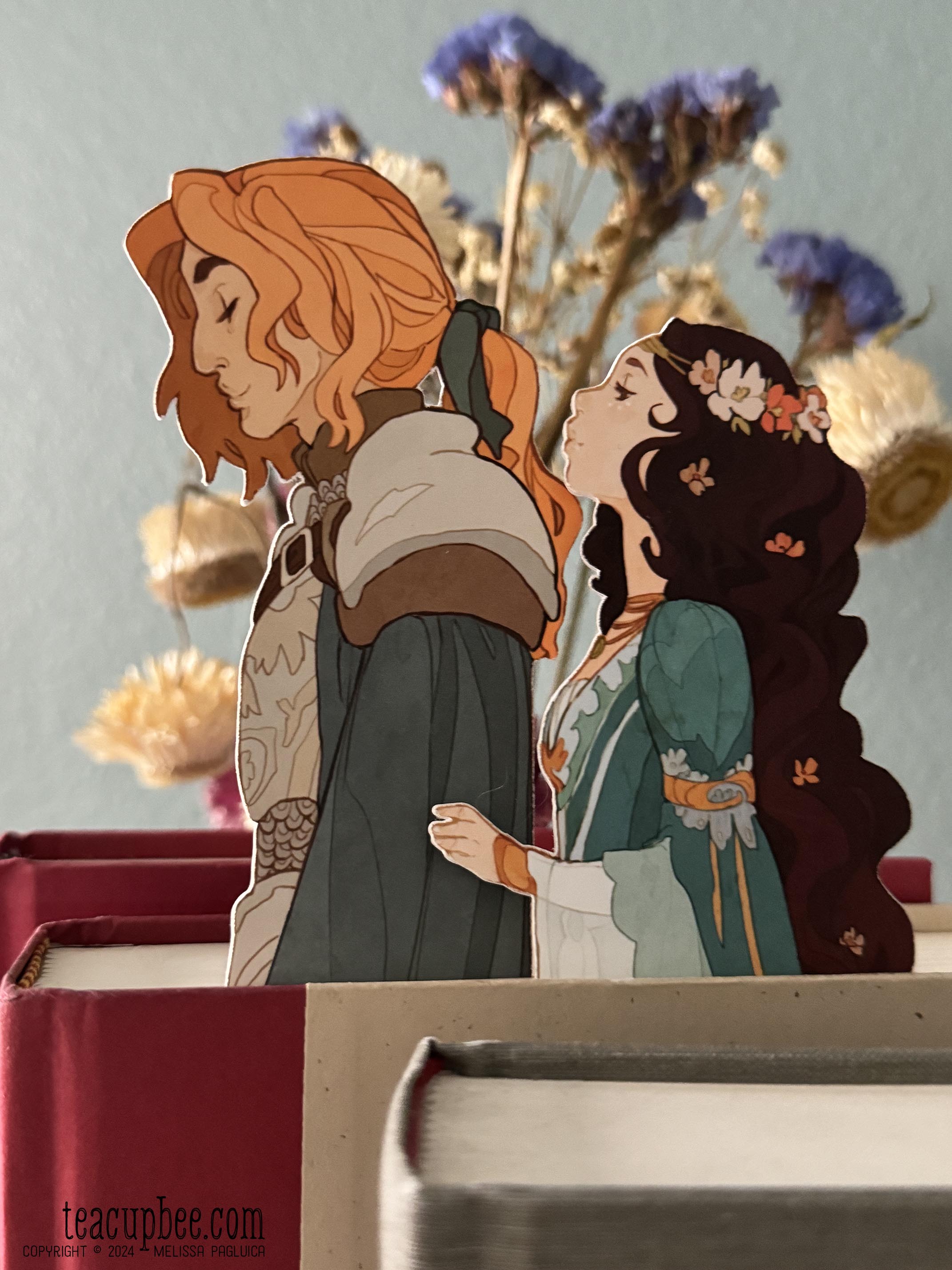 bookmark Illustrations of a couple embracing on a book with a floral background