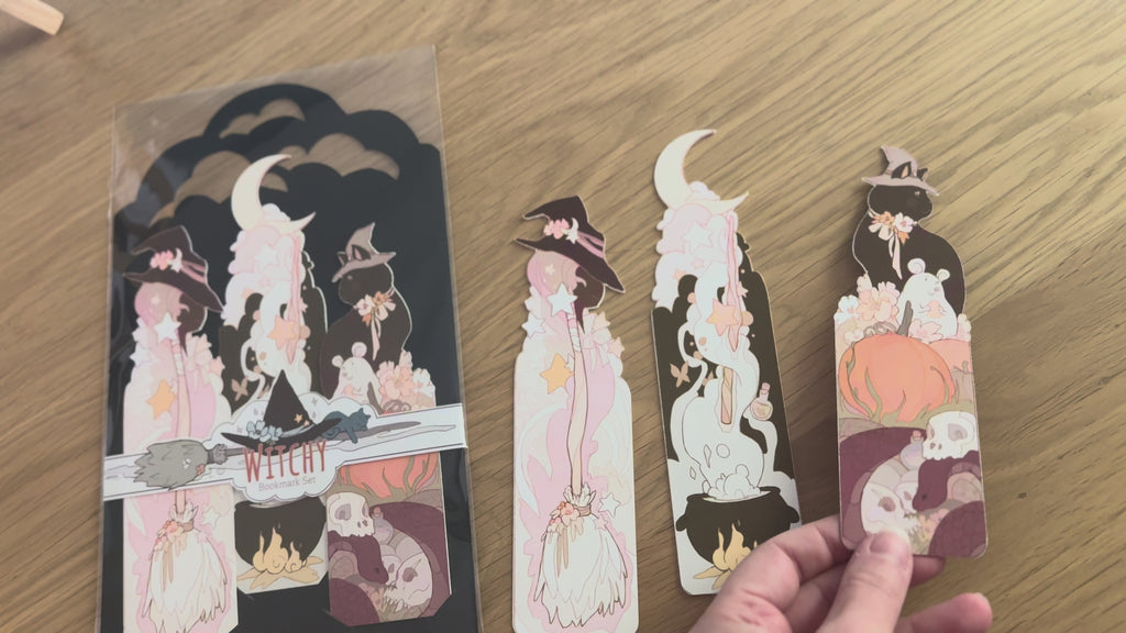 video featuring the three Witchy Bookmark designs along side it's packaging.